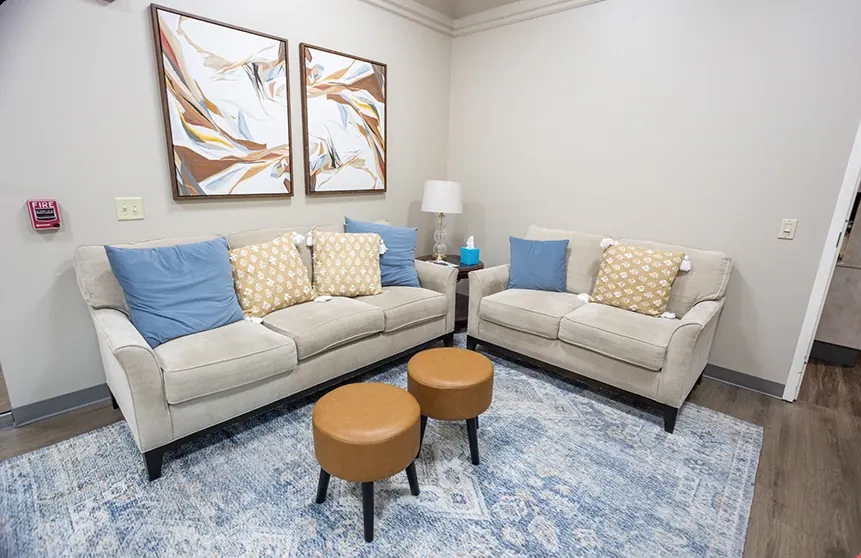 A lounge corner with sofas in the waiting area.